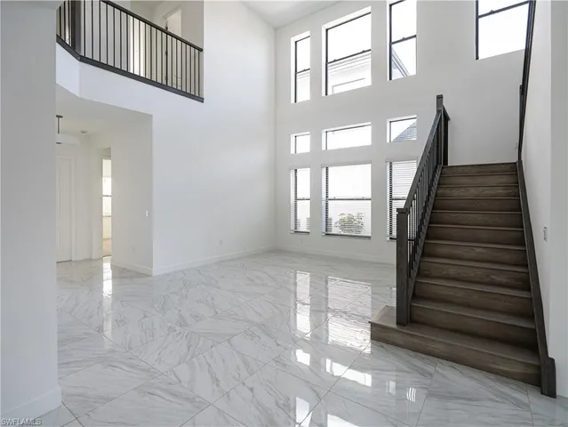 a view of an entryway with staircase