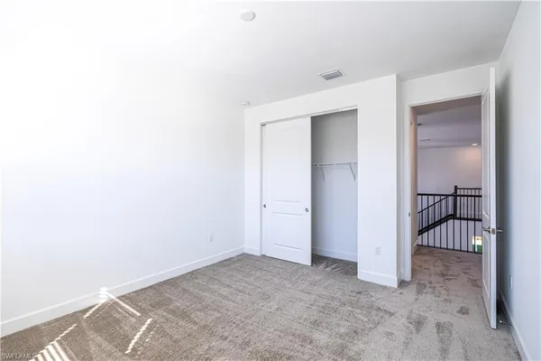 a view of a room with a hallway