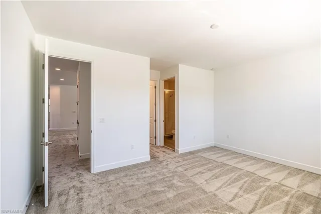 an empty room with a natural light