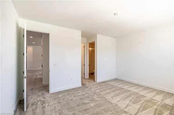 an empty room with a natural light