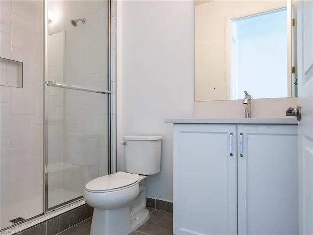 a view of a lake with a yard