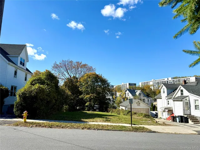a view of a house with a big yard