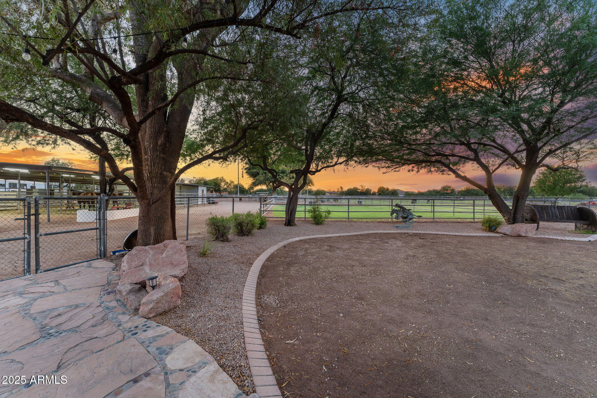 2601 East Mesquite Street Gilbert, AZ 85296 - Photo 48 of 69 Scenic pasture framed by Arizona sunsets