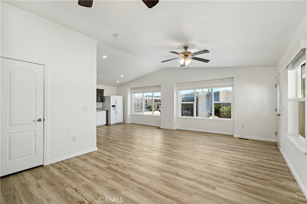 4650 Dulin Road, Unit 39 Fallbrook, CA 92003 - Photo 13 of 39 a view of an empty room with window and wooden floor
