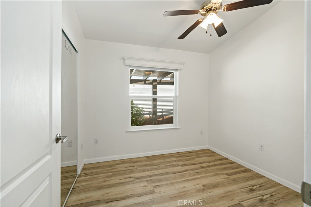 4650 Dulin Road, Unit 39 Fallbrook, CA 92003 - Photo 23 of 39 a view of empty room with wooden floor and fan