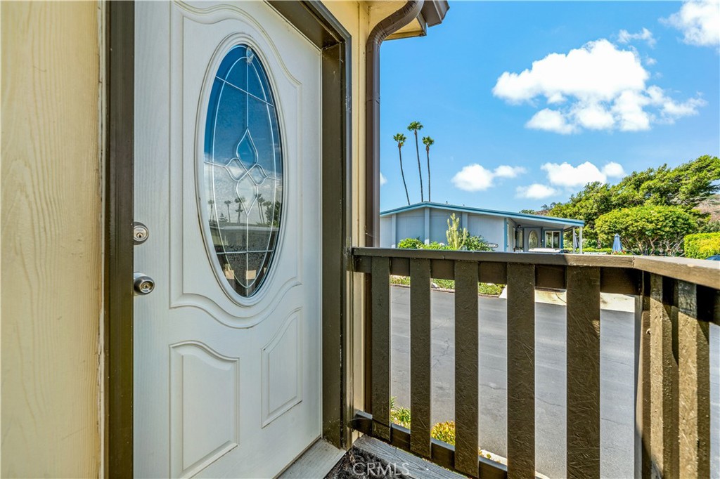 4650 Dulin Road, Unit 39 Fallbrook, CA 92003 - Photo 29 of 39 a view of a entryway door with wooden floor