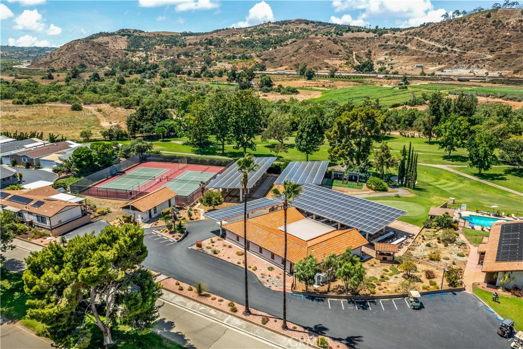 4650 Dulin Road, Unit 39 Fallbrook, CA 92003 - Photo 31 of 39 an aerial view of a house a yard and mountain