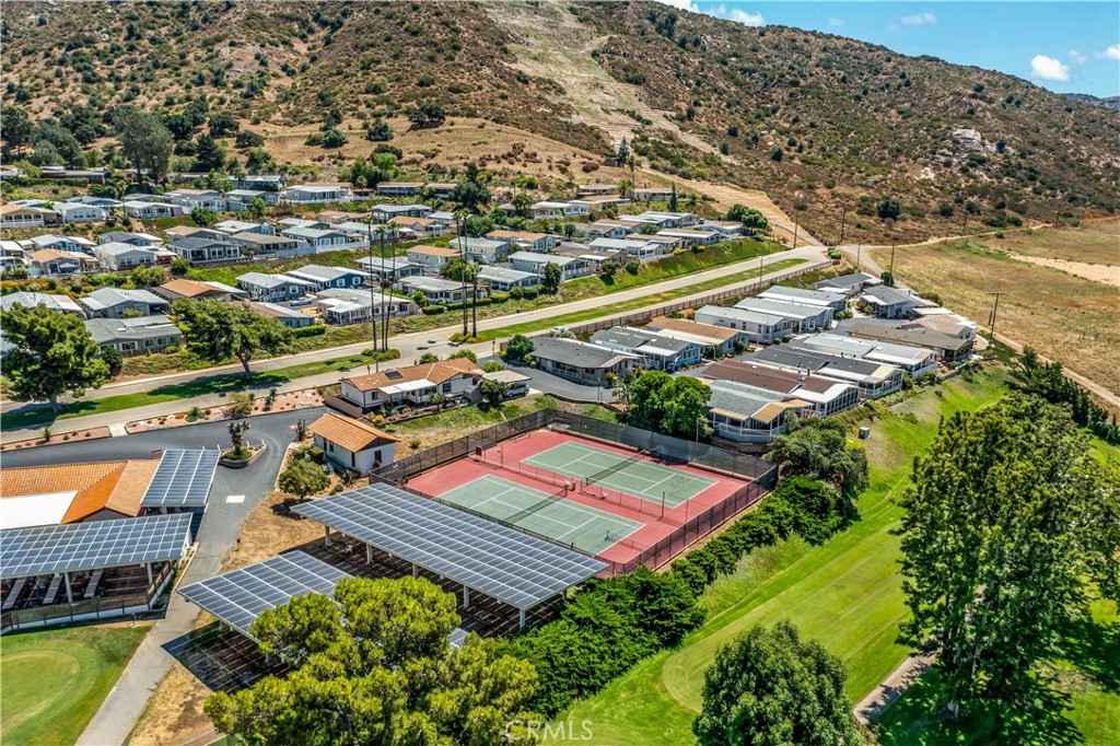 4650 Dulin Road, Unit 39 Fallbrook, CA 92003 - Photo 32 of 39 an aerial view of a pool yard and mountain view in back
