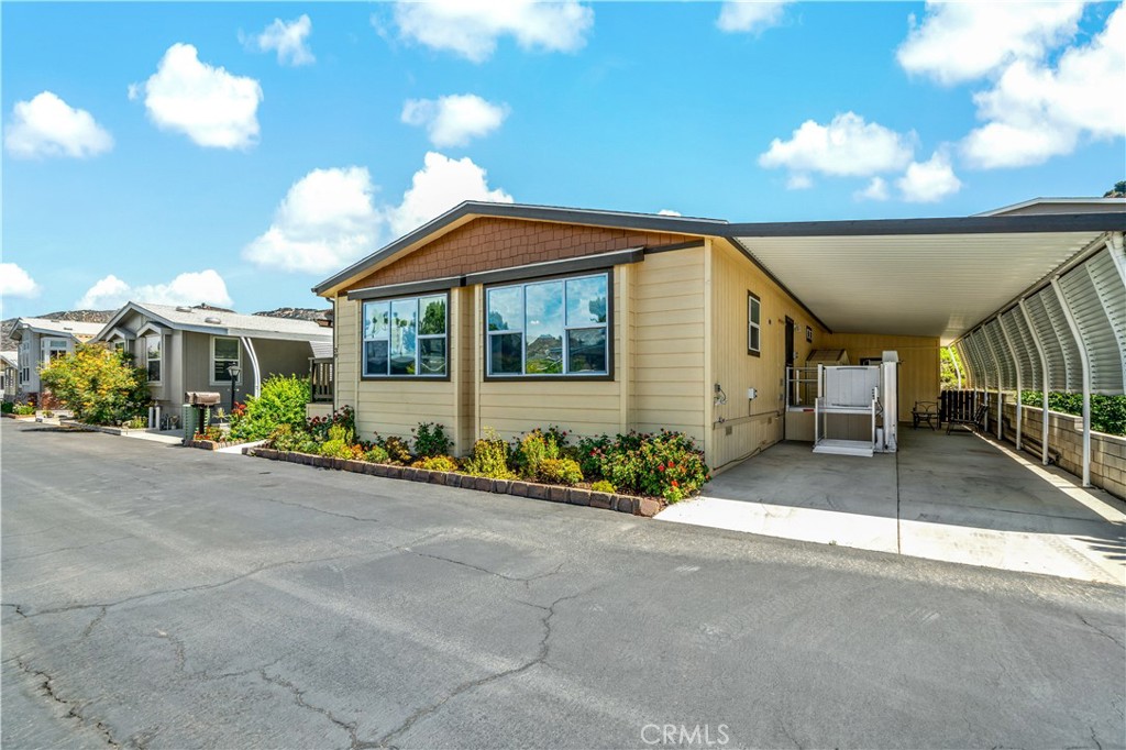 4650 Dulin Road, Unit 39 Fallbrook, CA 92003 - Photo 4 of 39 a view of a house with a garage