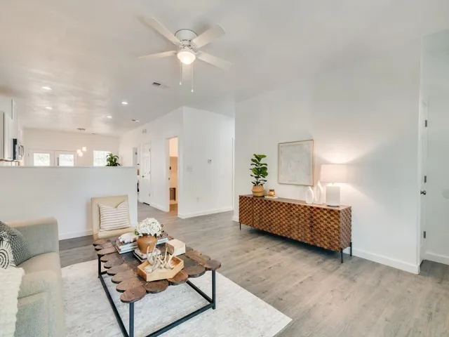 a living room with furniture and a couch