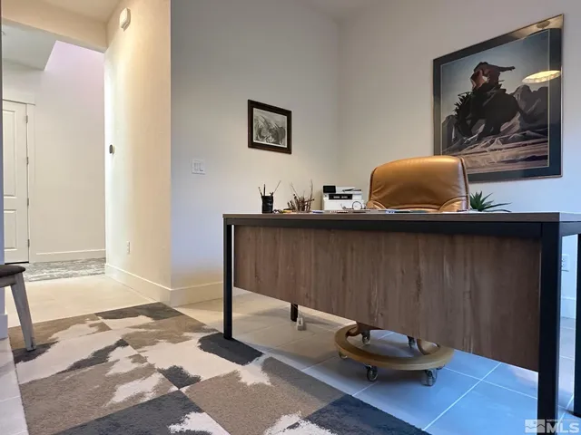 a living room with a couch and a table