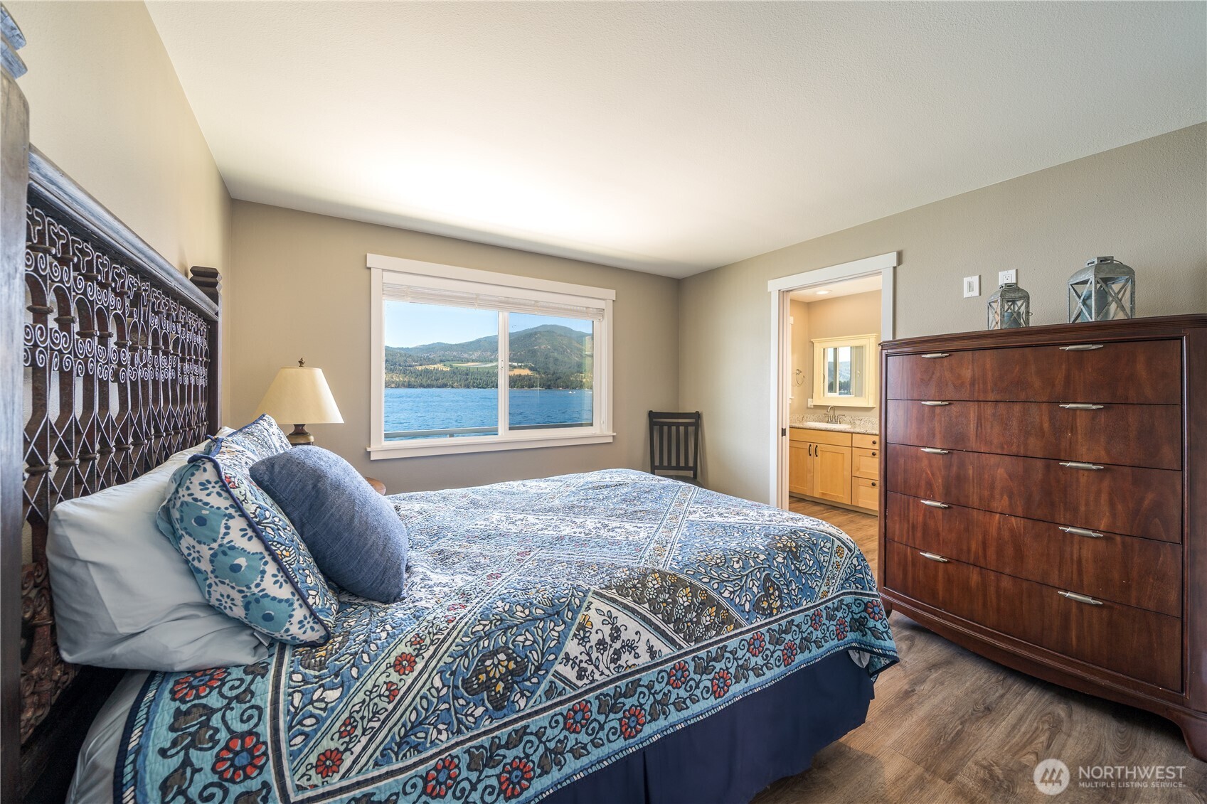 665 Manson Boulevard Manson, WA 98831 - Photo 14 of 39 a bedroom with a bed and window