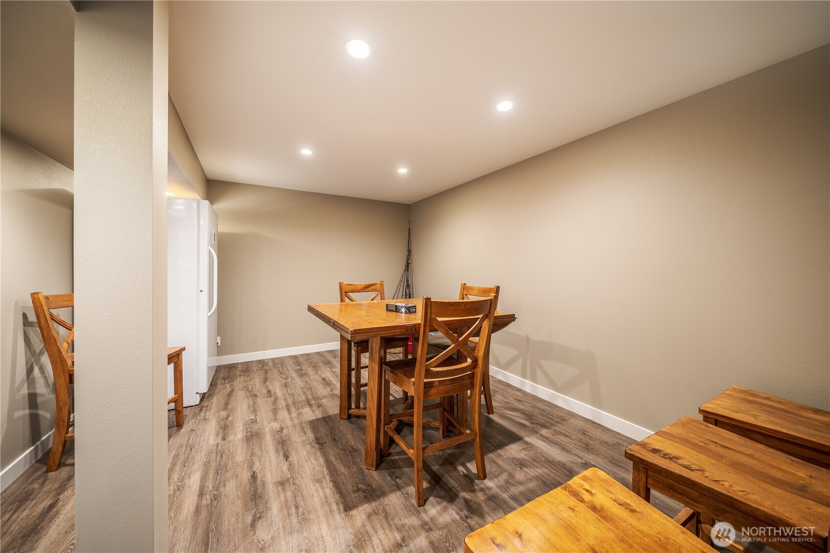 665 Manson Boulevard Manson, WA 98831 - Photo 21 of 39 a workspace with furniture and wooden floor