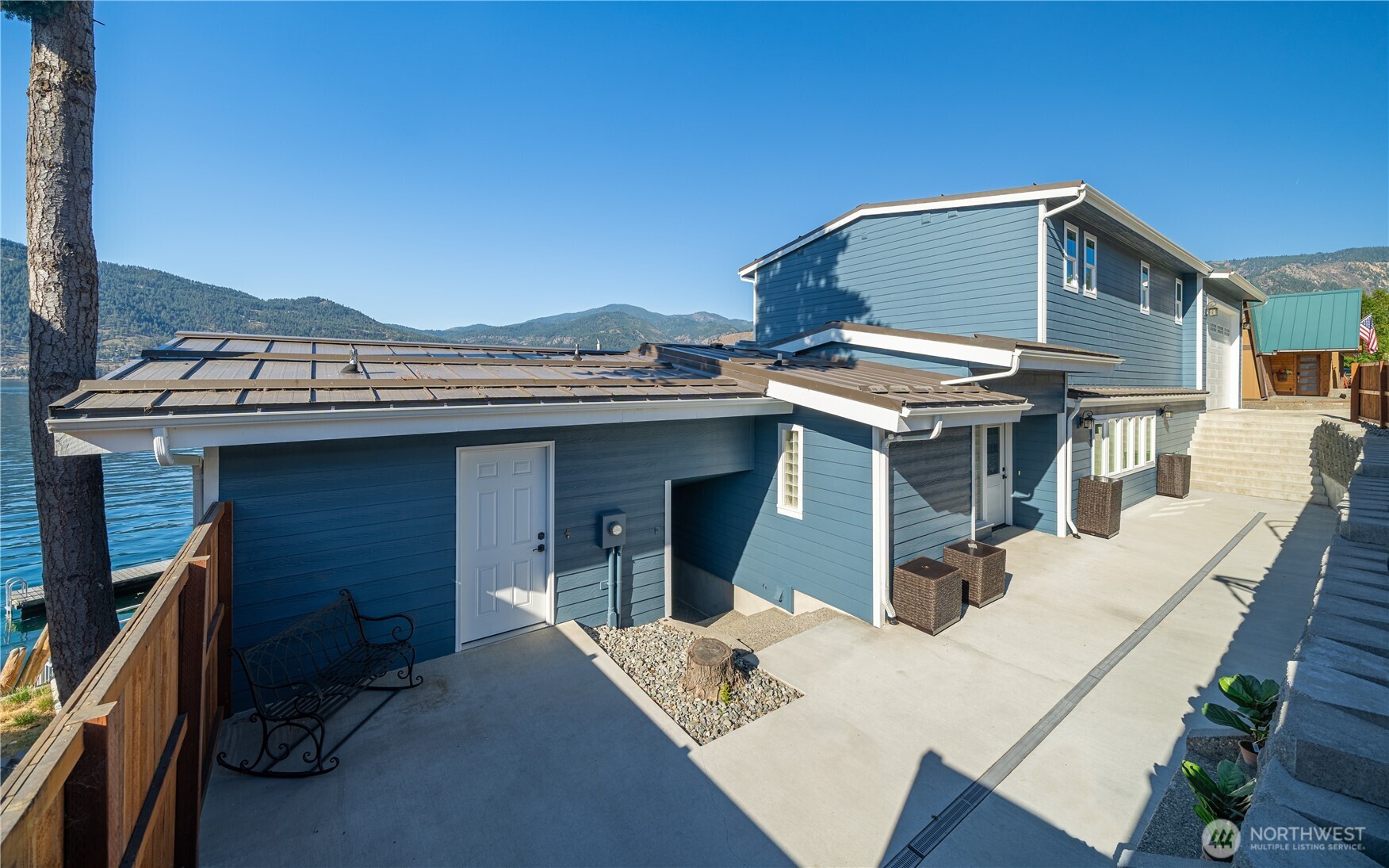 665 Manson Boulevard Manson, WA 98831 - Photo 24 of 39 a view of a house with a dinning space and balcony