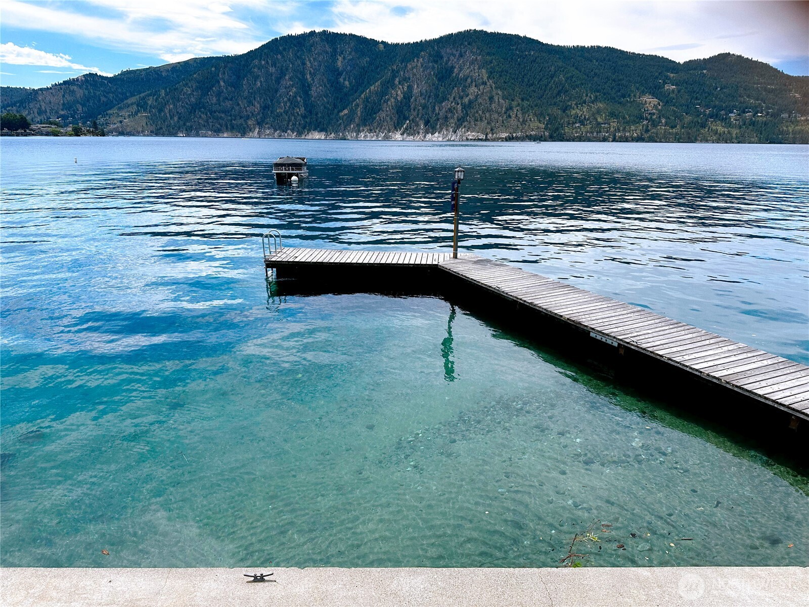 665 Manson Boulevard Manson, WA 98831 - Photo 27 of 39 a view of lake with mountain