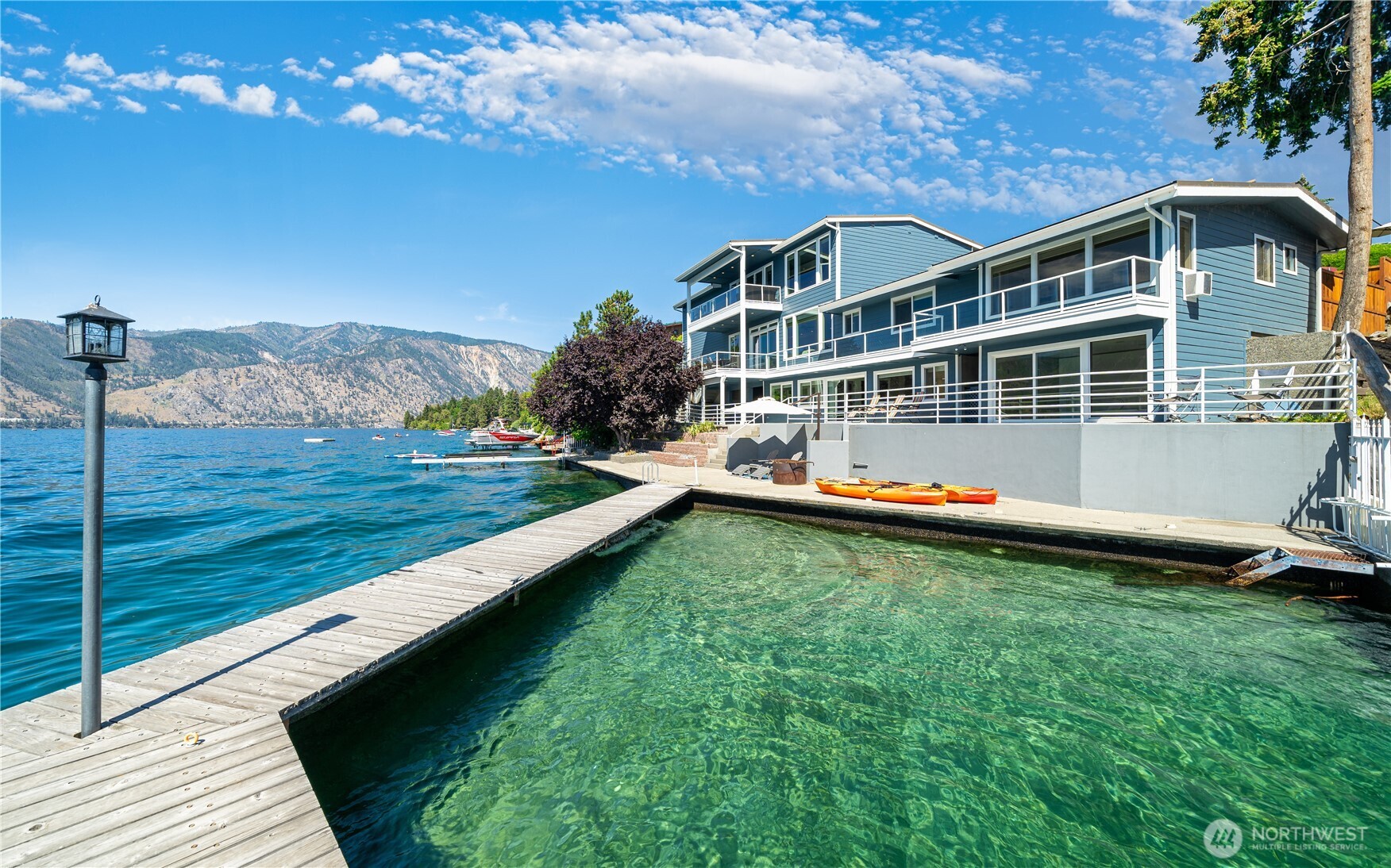 665 Manson Boulevard Manson, WA 98831 - Photo 32 of 39 a view of a house with a yard