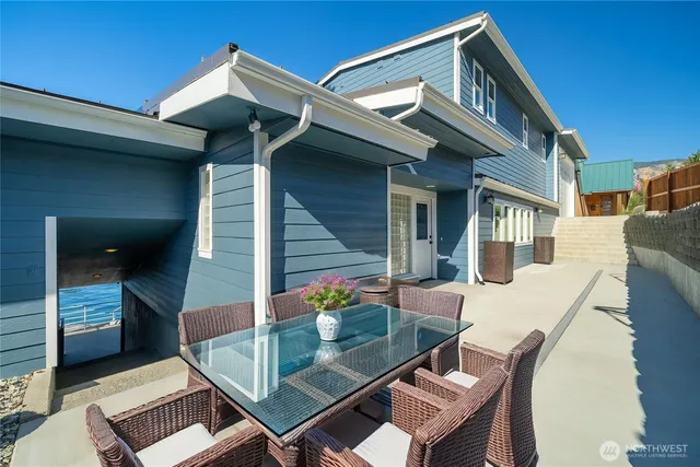 a front view of a house with parking space