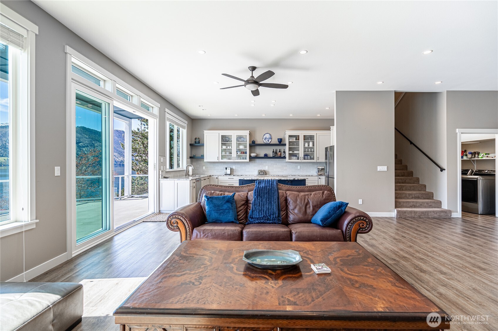 665 Manson Boulevard Manson, WA 98831 - Photo 5 of 39 a living room with furniture and a large window