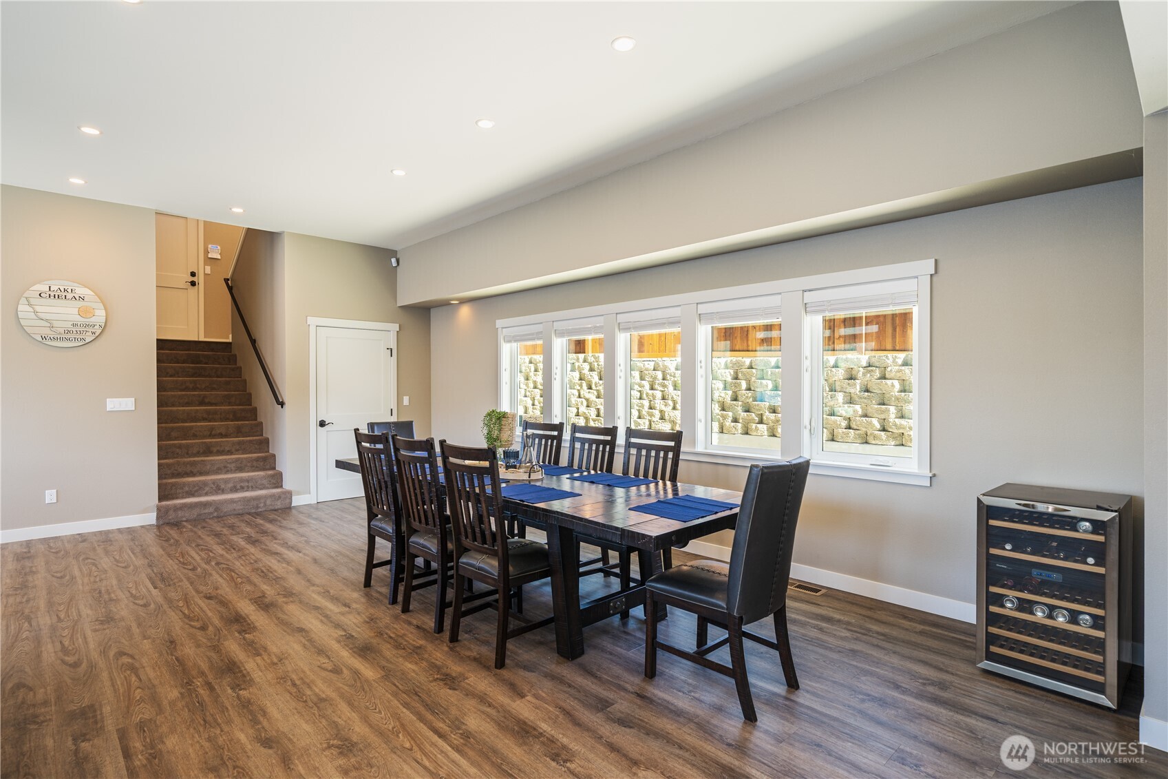 665 Manson Boulevard Manson, WA 98831 - Photo 8 of 39 a view of a dining room with furniture window and wooden floor