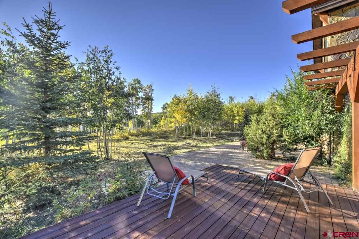 302 Maverick Lane Montrose, CO 81403 - Photo 35 of 35 a view of a chairs and table on the wooden floor