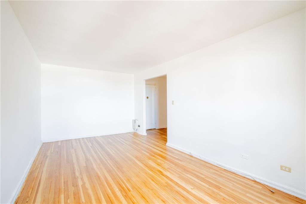 7259 Shore Road, Unit 6G Brooklyn, NY 11209 - Photo 18 of 30 a view of a room with wooden floor