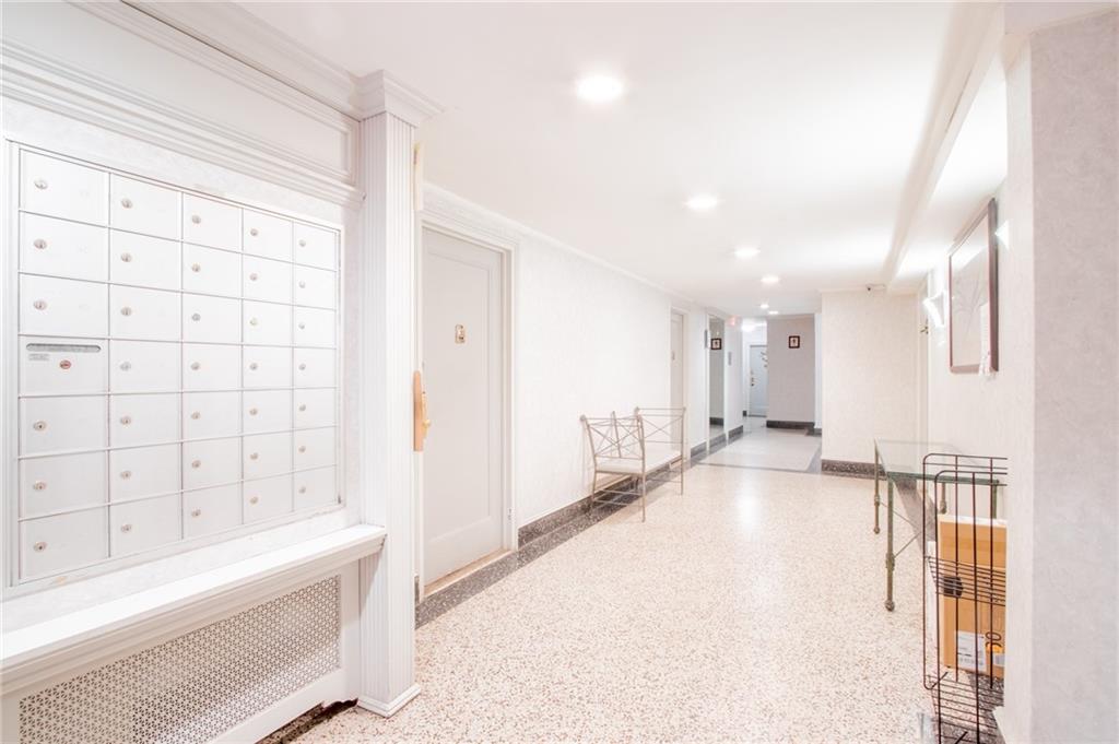 7259 Shore Road, Unit 6G Brooklyn, NY 11209 - Photo 19 of 30 a view of a bathroom with a tub and shower