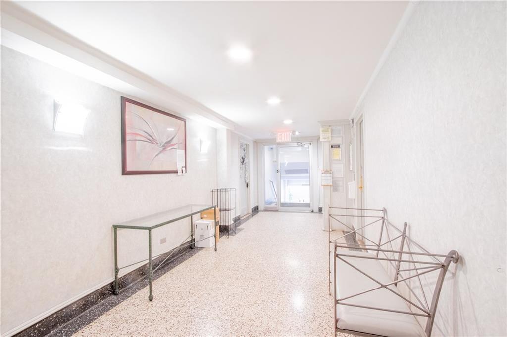 7259 Shore Road, Unit 6G Brooklyn, NY 11209 - Photo 20 of 30 a view of a livingroom with furniture and furniture