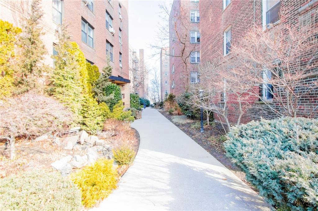 7259 Shore Road, Unit 6G Brooklyn, NY 11209 - Photo 25 of 30 a view of a pathway both side of building