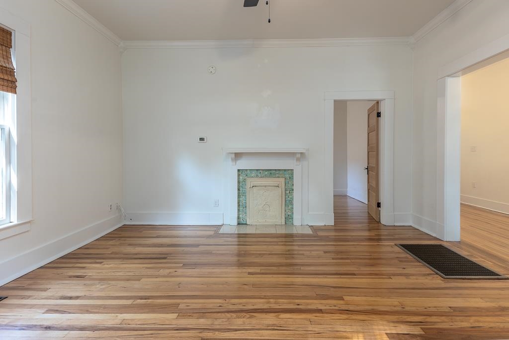 119 South Fenwick Road Memphis, TN 38111 - Photo 23 of 28 a view of an empty room with wooden floor and a window