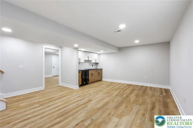 a front view of a house with a garage