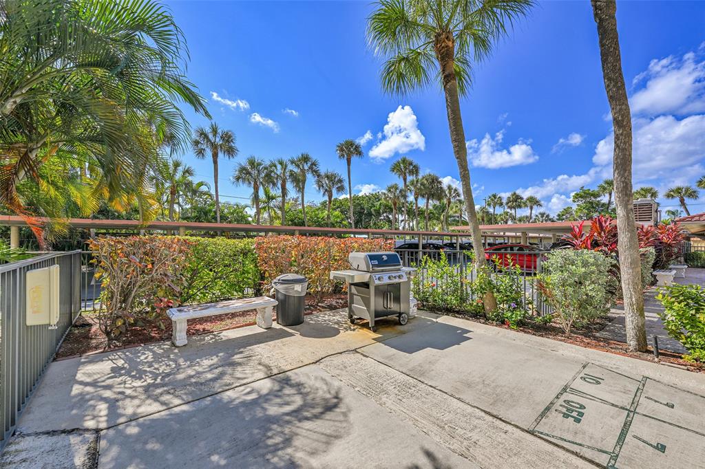 2350 Northeast 14th Street Causeway, Unit 609 Pompano Beach, FL 33062 - Photo 25 of 42 a view of a patio with iron fence