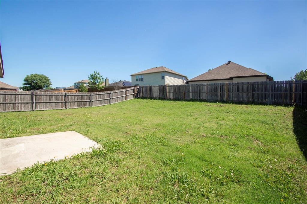 1423 Swan Ridge Drive Sherman, TX 75092 - Photo 17 of 21 Fenced backyard featuring a patio area
