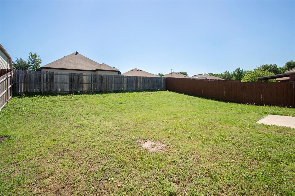 1423 Swan Ridge Drive Sherman, TX 75092 - Photo 20 of 21 View of fenced backyard
