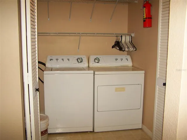 a view of a park with large trees