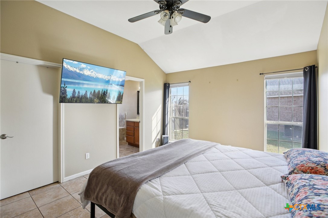 7114 Pappus Court Temple, TX 76502 - Photo 17 of 28 a bedroom with a bed and a window