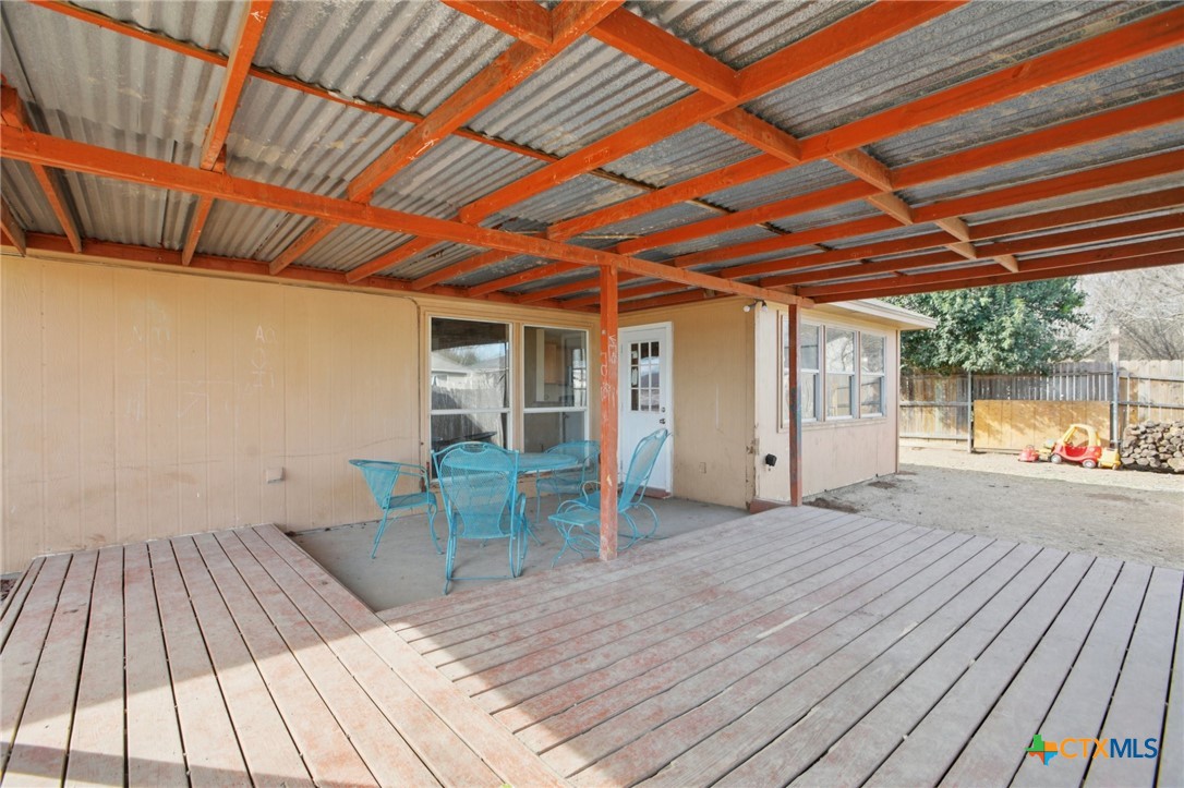 7114 Pappus Court Temple, TX 76502 - Photo 25 of 28 a view of backyard with a sink and wooden floor