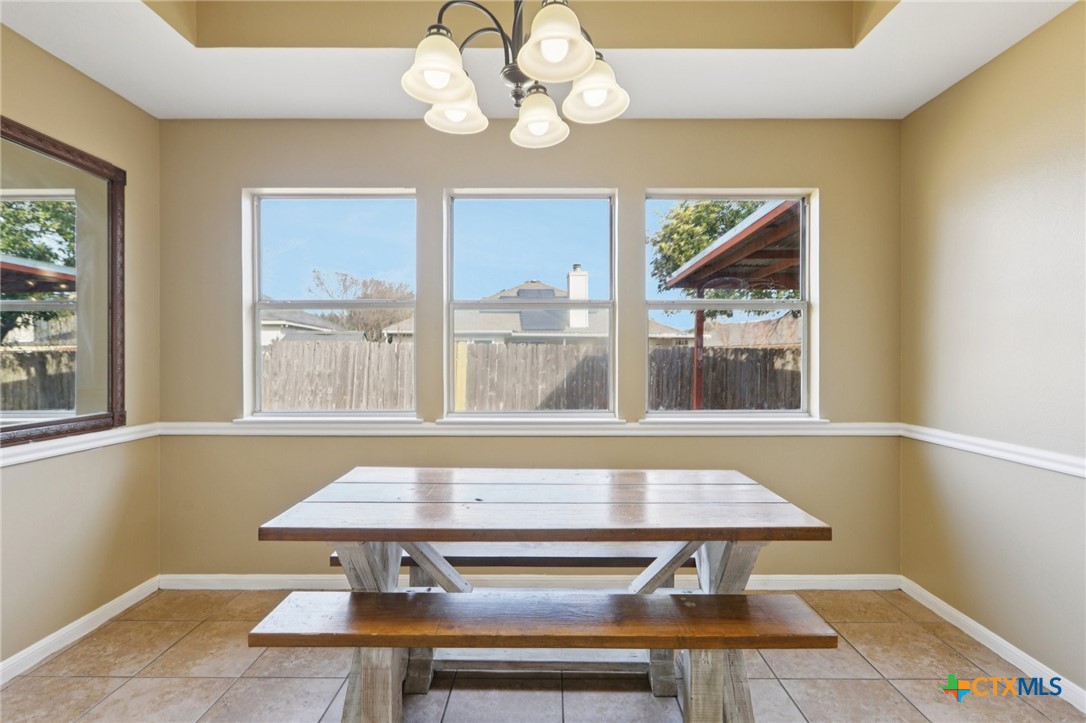 7114 Pappus Court Temple, TX 76502 - Photo 10 of 28 a view of a room with a table and chairs