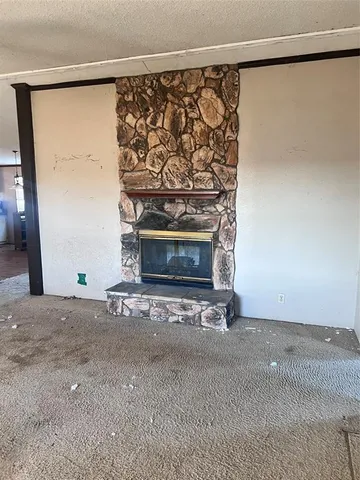 a living room with a fireplace