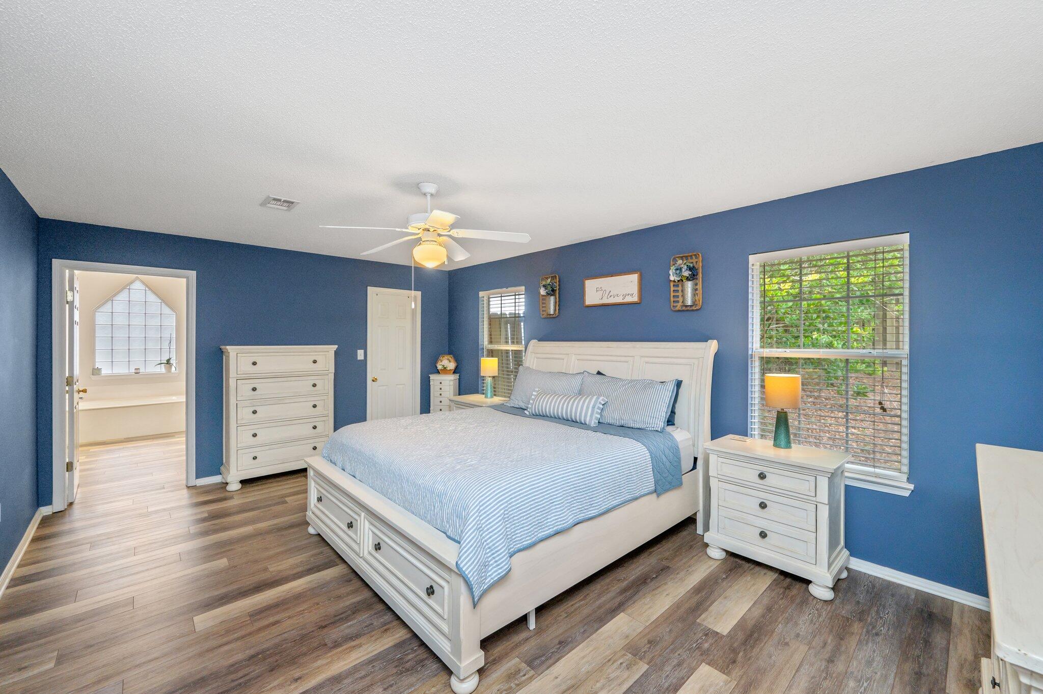 730 Denise Drive Crestview, FL 32536 - Photo 15 of 40 a bedroom with a large bed and a window