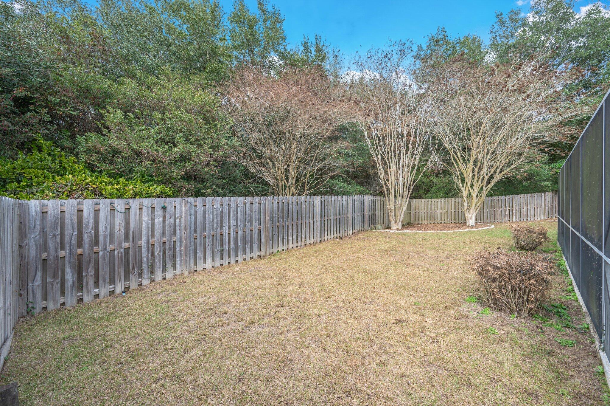 730 Denise Drive Crestview, FL 32536 - Photo 38 of 40 a view of backyard and tree