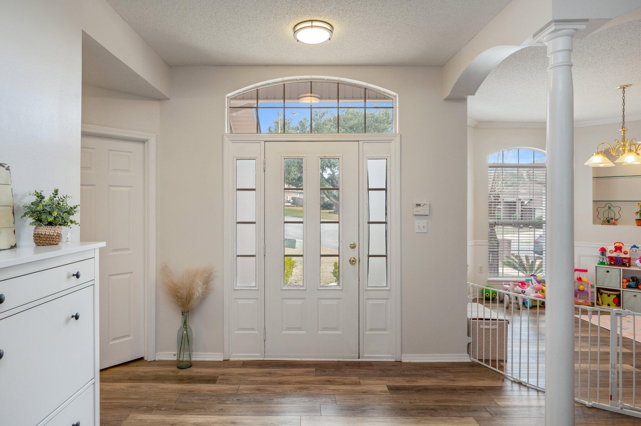730 Denise Drive Crestview, FL 32536 - Photo 4 of 40 a view of an entryway with wooden floor