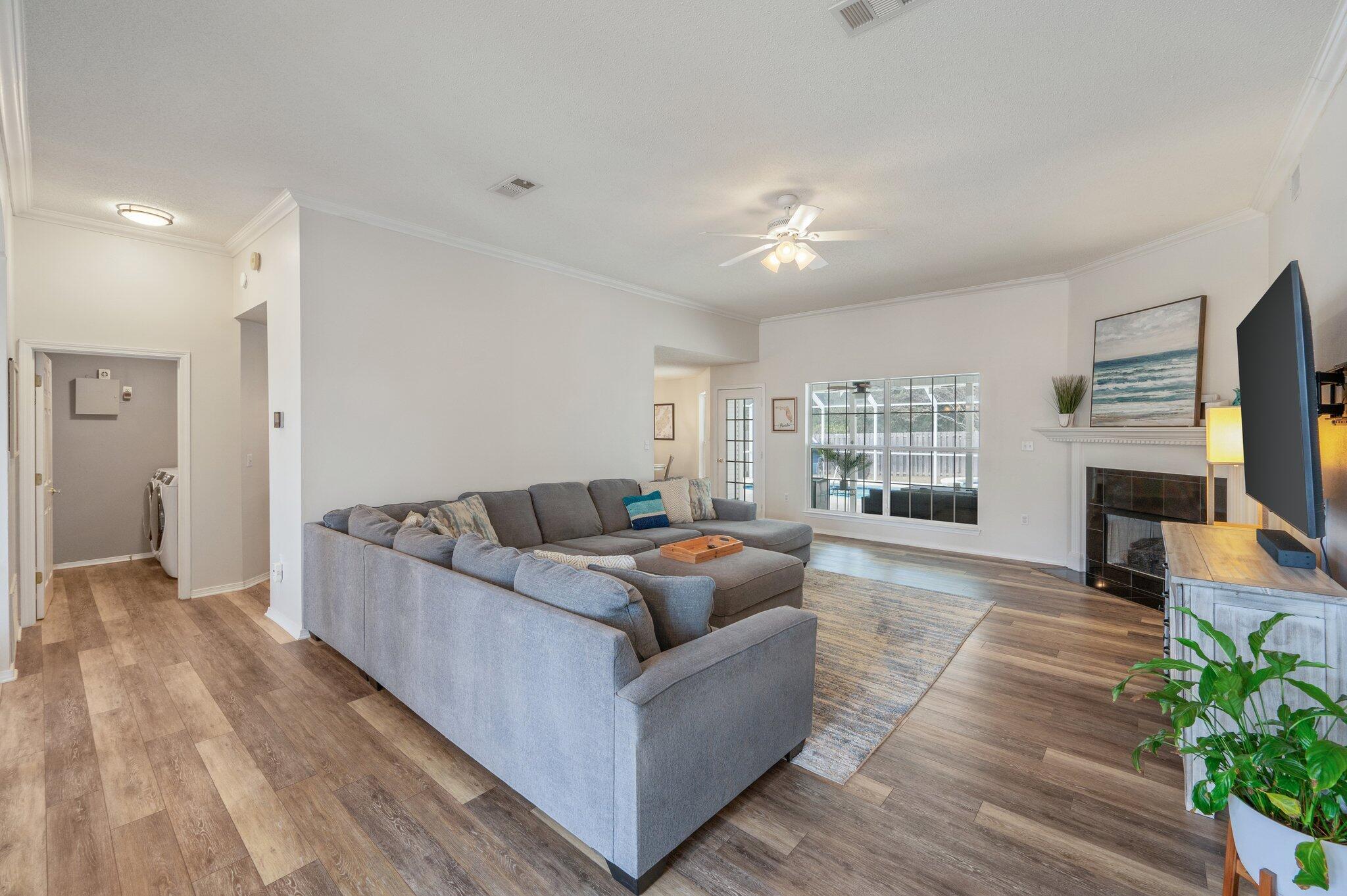 730 Denise Drive Crestview, FL 32536 - Photo 7 of 40 a living room with furniture and a flat screen tv