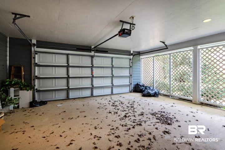 12 Stonebridge Court Mobile, AL 36608 - Photo 23 of 38 Garage with a garage door opener
