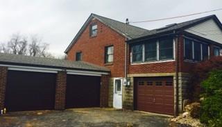 524 Friel Road Baden, PA 15005 - Photo 1 of 25 View from the driveway. Porch area above integral garage is where tiled hot tub area is located.