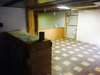524 Friel Road Baden, PA 15005 - Photo 19 of 25 View from behind the bar. Door leads to integral garage.