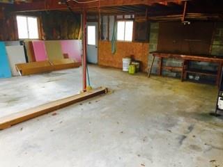 524 Friel Road Baden, PA 15005 - Photo 21 of 25 Two car garage with walkout access on the back door.
