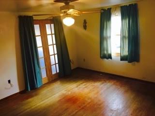 524 Friel Road Baden, PA 15005 - Photo 7 of 25 Master bed room with double doors to the front entry / hot tub area.