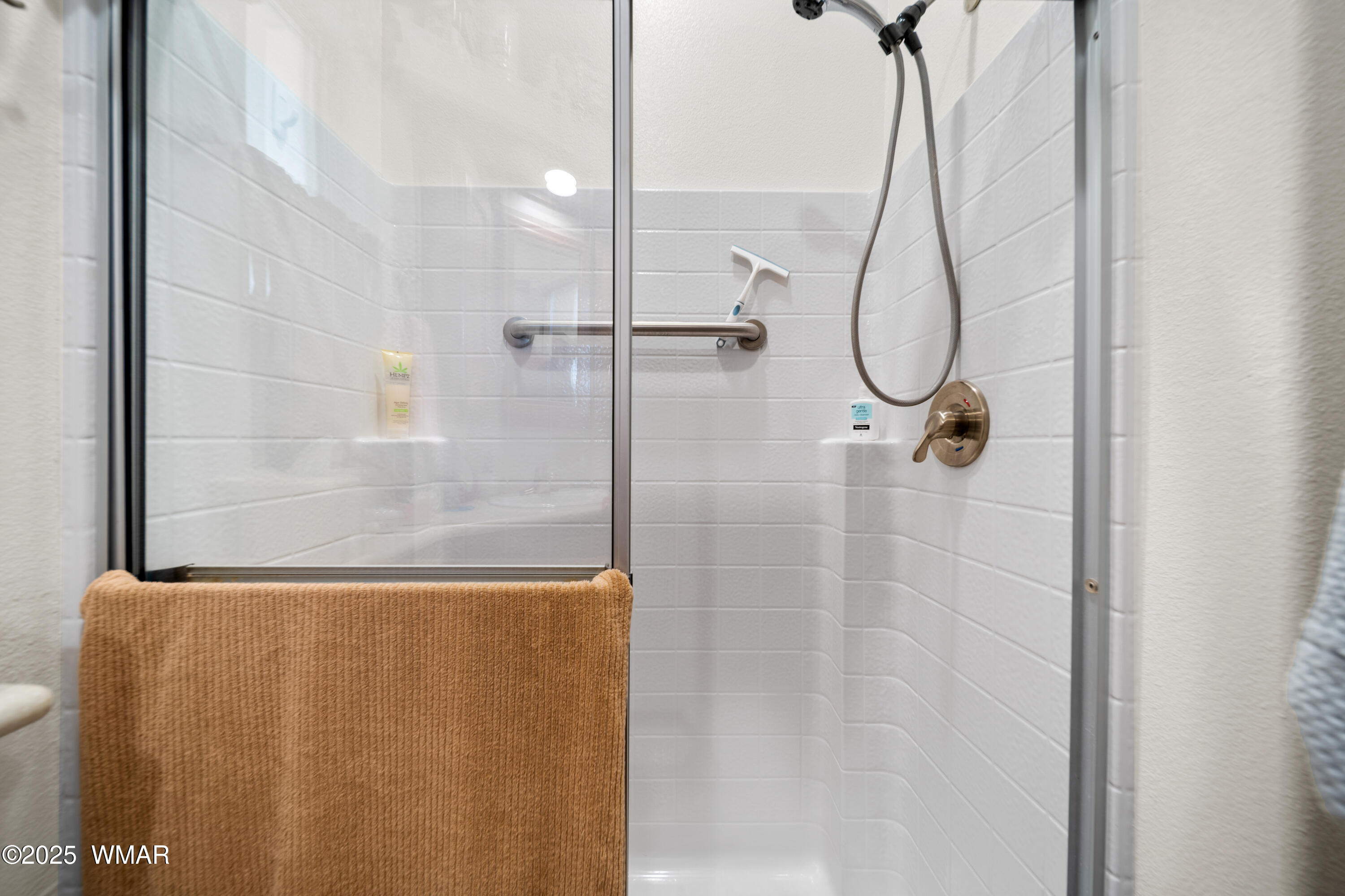 8213 Apache Way, Unit 415 Show Low, AZ 85901 - Photo 11 of 16 a bathroom with a shower