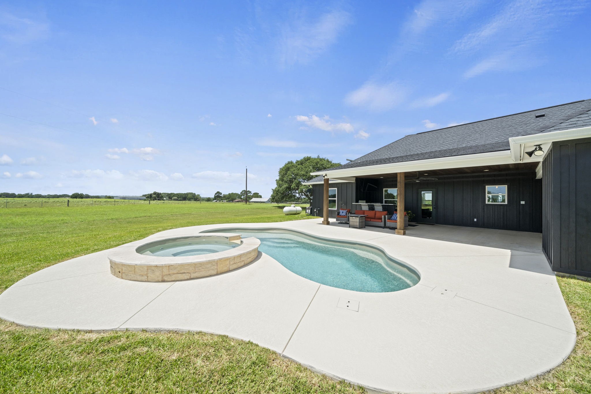 1655 Old Cuero Road Yoakum, TX 77995 - Photo 1 of 24 The expansive concrete deck offers plenty of space for lounging, entertaining, or soaking up the sun, while the wide-open acreage creates a peaceful sense of privacy and tranquility.