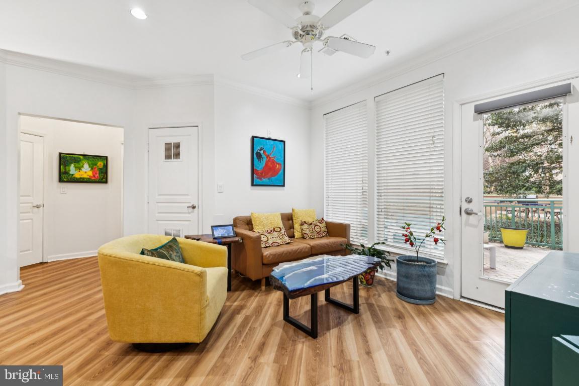 12000 Market Street, Unit 151 Reston, VA 20190 - Photo 11 of 58 Living Rm with plenty of windows & balcony access